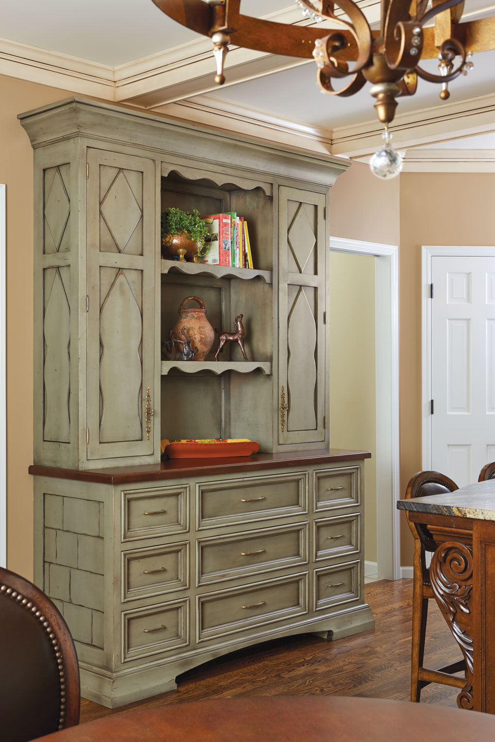 A stand-alone cabinet plays the role of utility player in a kitchen.
