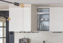 In-cupboard Drip Tray A drip tray above a sink is a clever way to store dishes while also drying them.