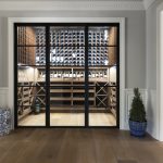 A butler's pantry was transformed into an impressive wine room that helps display and store a collection of nearly 1,000 bottles.