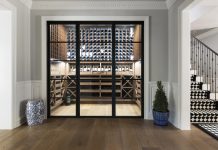 A butler's pantry was transformed into an impressive wine room that helps display and store a collection of nearly 1,000 bottles.