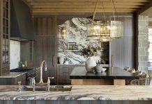 The interplay of materials in this 921-square-foot kitchen is striking, from the Calacatta Viola marble and soapstone to rift oak cabinetry.