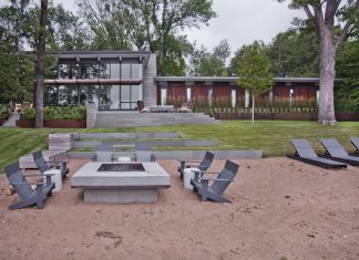 Casacading terraces create distinct zones for outdoor enjoyment paired with lake views.